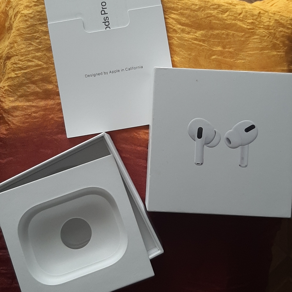 Apple AirPods box with Inside Manual